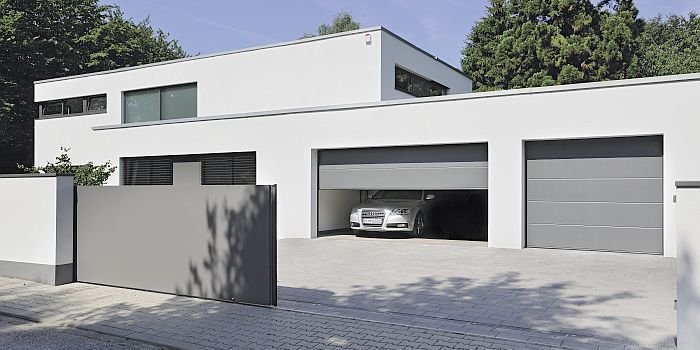 Ciepły garaż – ciepły dom. Jak wybrać bramę garażową?