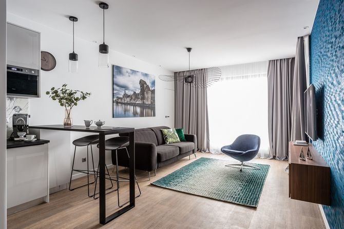 Mieszkanie ze szmaragdem w tleFot. Studio Projekt/ Dekorian