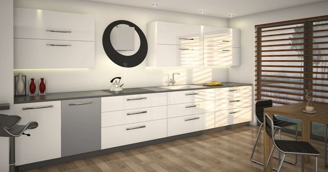 Głównym elementem dekoracyjnym w minimalistycznej kuchni jest designerski okap.