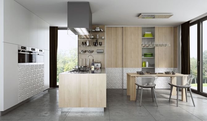 W dużej przestrzeni połączeniem kuchni z pokojem dziennym może być część jadalna