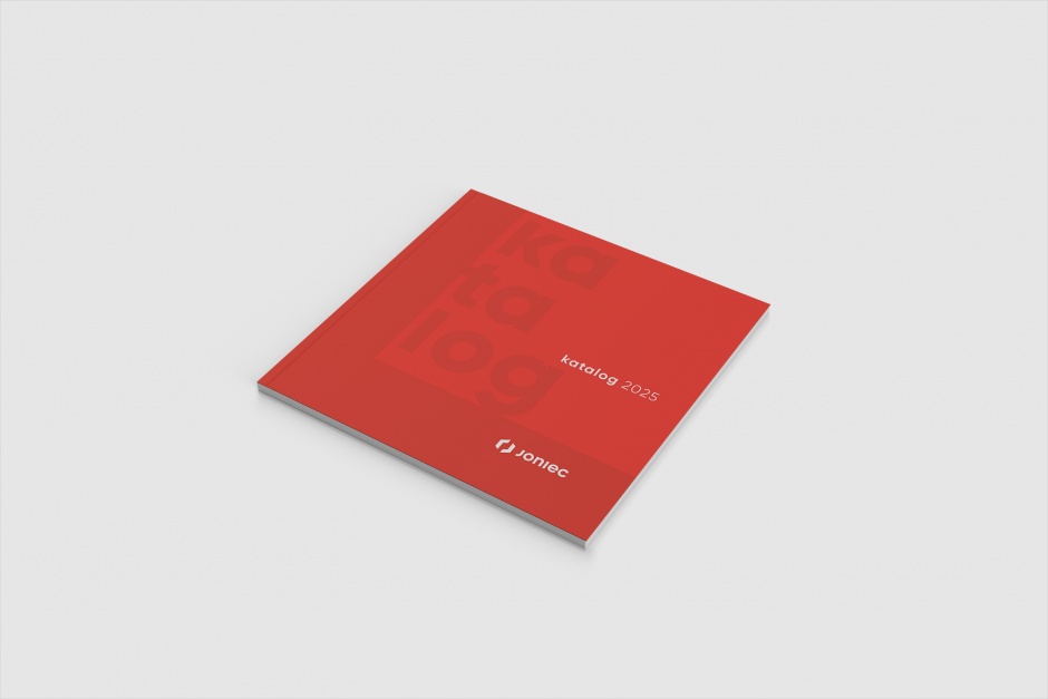 katalog w czerwonej okladkce na szarym tle